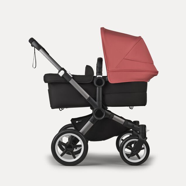 Bugaboo Donkey 5 twin stroller graphite base, midnight black fabrics, sunrise red sun canopy - Main Image Slide 2 of 12