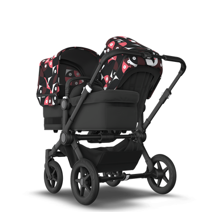 Bugaboo Donkey 5 Duo bassinet and seat stroller black base, midnight black fabrics, animal explorer pink/ red sun canopy
