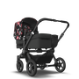 Bugaboo Donkey 5 Mono bassinet and seat stroller black base, midnight black fabrics, animal explorer pink/ red sun canopy
