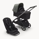 Refurbished Bugaboo Dragonfly bassinet and seat stroller graphite base, midnight black fabrics, forest green sun canopy