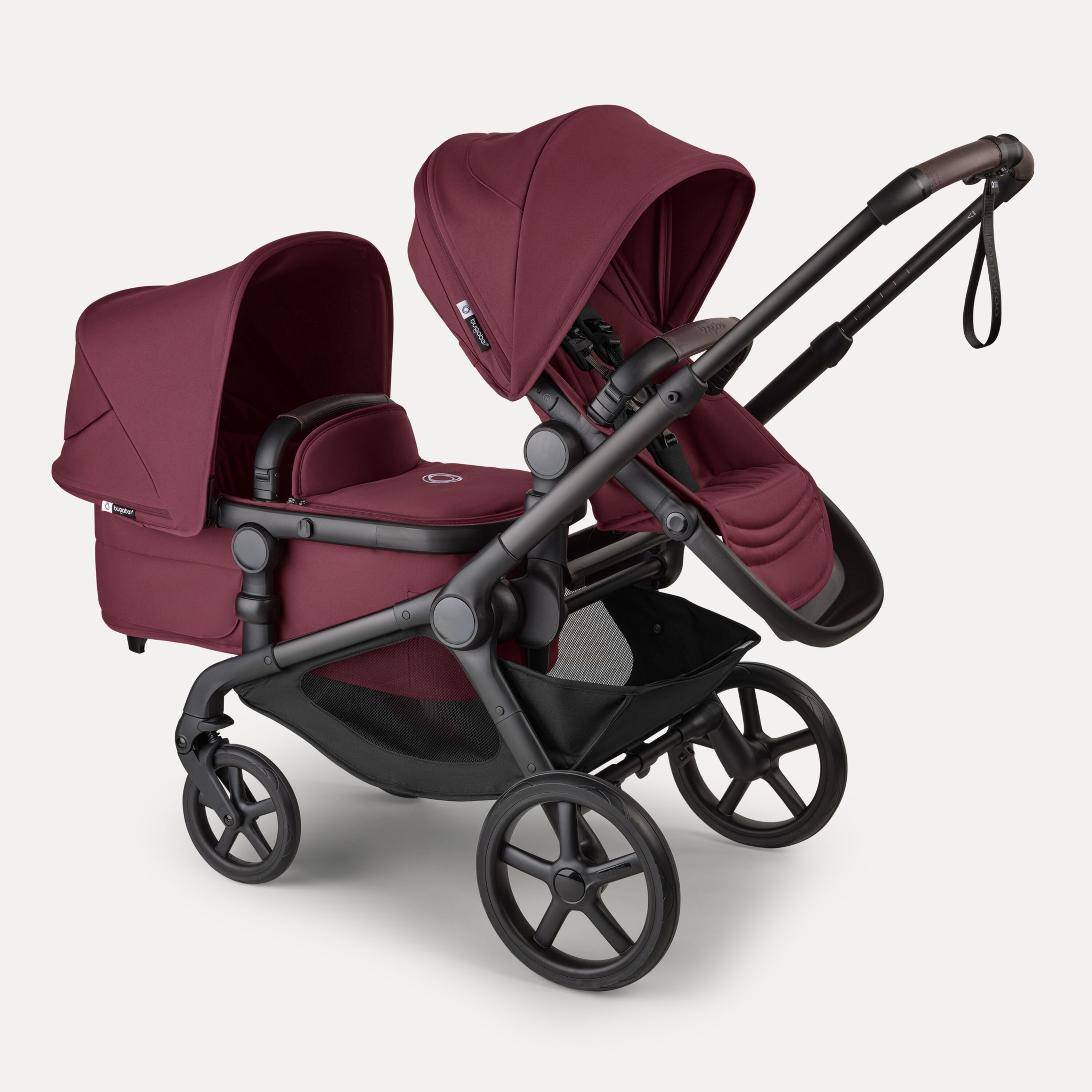 Bugaboo Kangaroo 2-in-1 tandem stroller with one seat above and one bassinet below, with Dark Cherry fabrics and Dark Cherry sun canopies. - Main Modal Image Slide 3 of 18