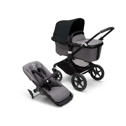 Bugaboo Fox 3 bassinet and seat stroller with black frame, grey fabrics, and black sun canopy.