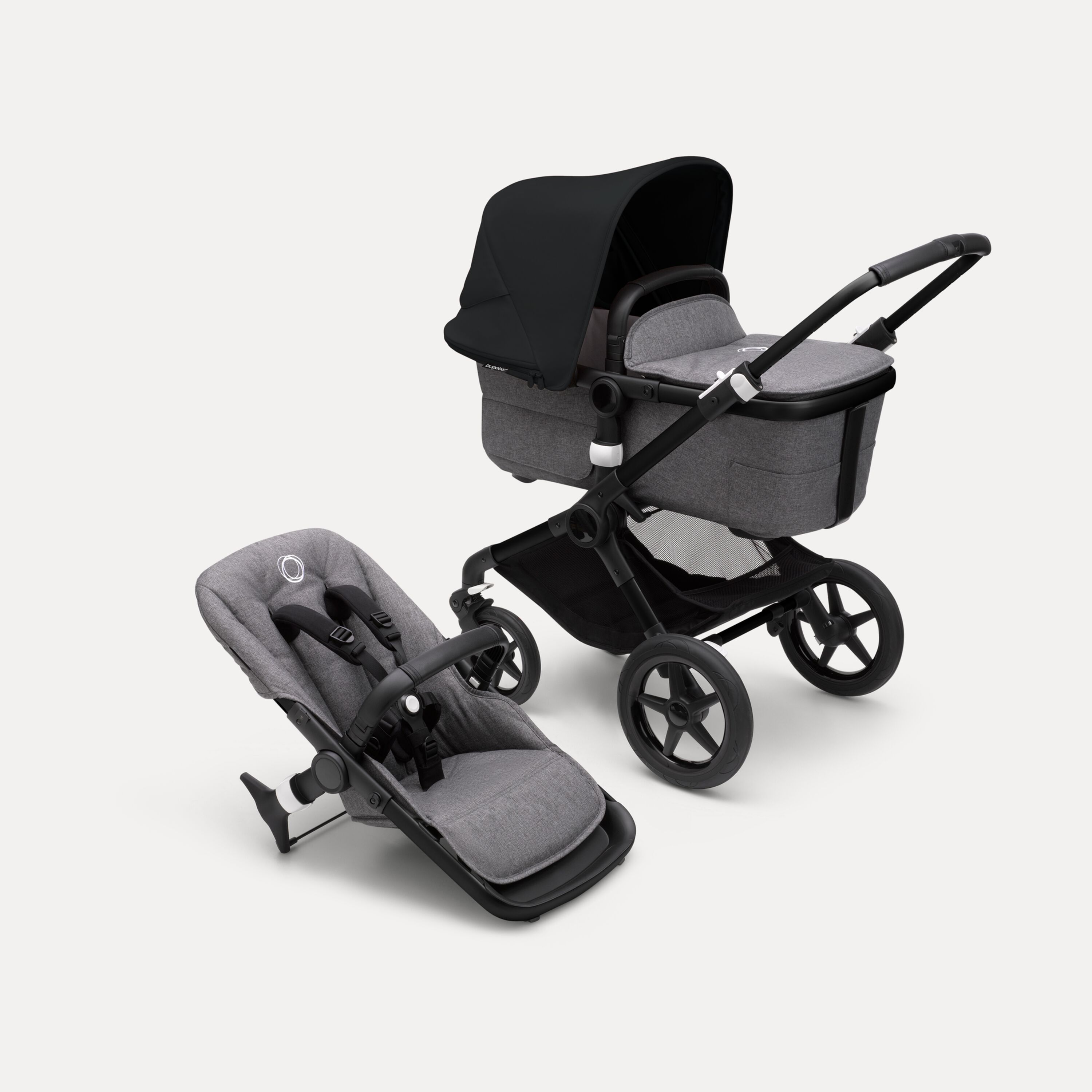 Bugaboo Fox 3 bassinet and seat stroller with black frame, grey fabrics, and black sun canopy. - Main Modal Image Slide 1 of 7