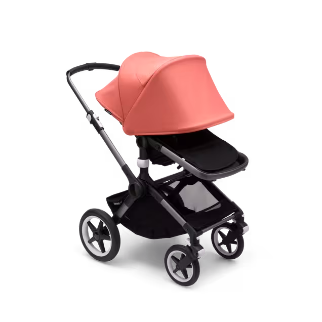 Bugaboo Fox 3 seat stroller with graphite frame, black fabrics, and red sun canopy fully extended. - Main Image Slide 8 of 9