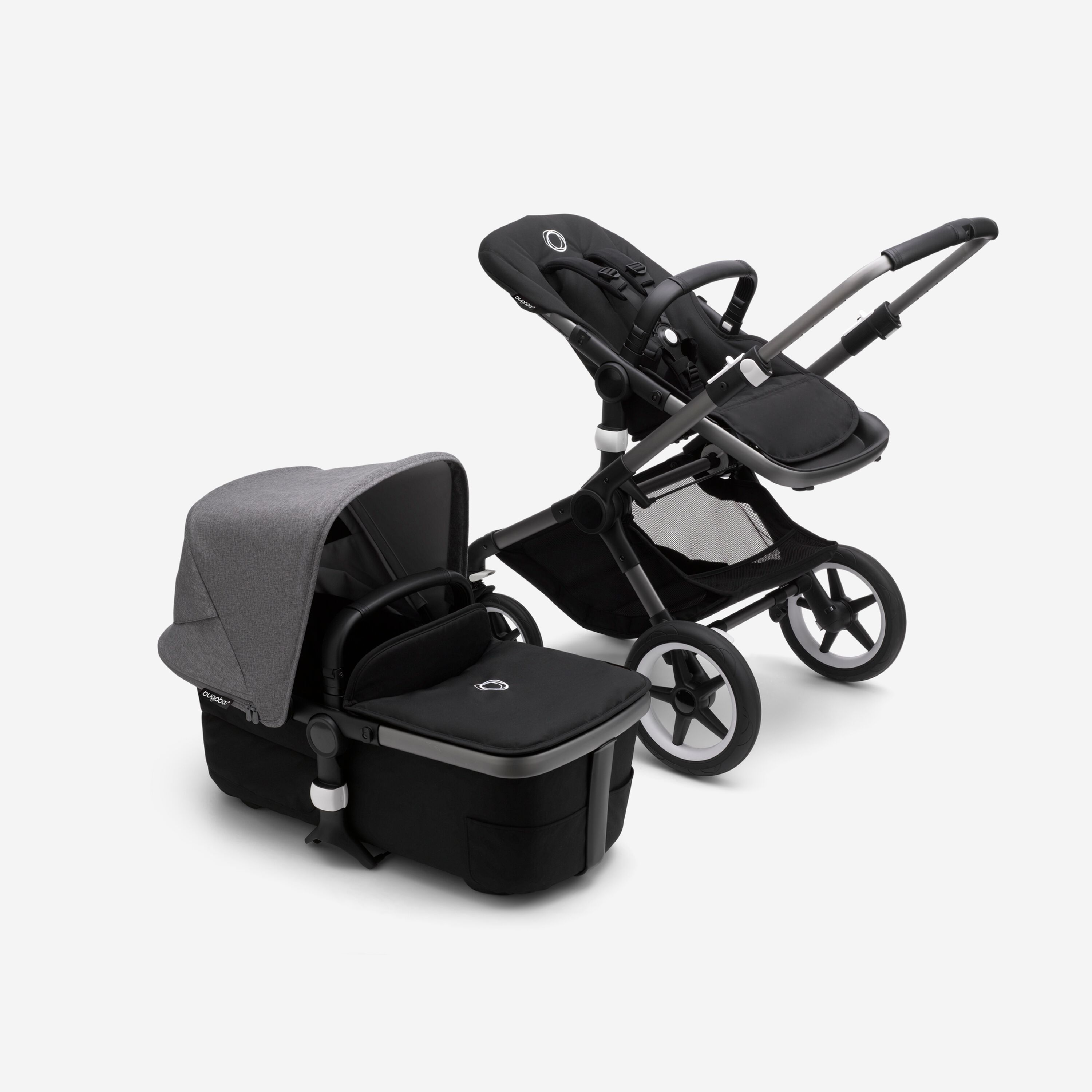 Bugaboo Fox 3 bassinet and seat stroller with graphite frame, black fabrics, and grey sun canopy. - Main Modal Image Slide 5 of 7