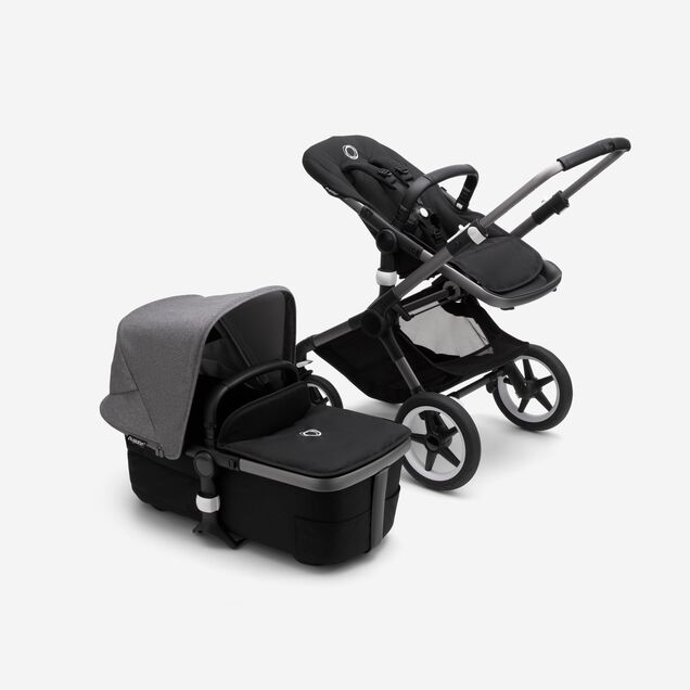 Bugaboo Fox 3 bassinet and seat stroller with graphite frame, black fabrics, and grey sun canopy. - Main Image Slide 5 of 7