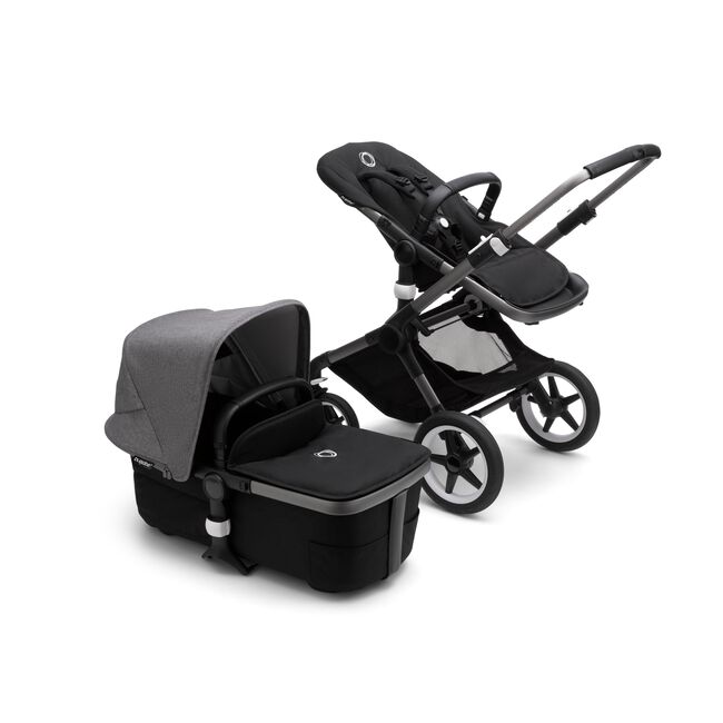 Bugaboo Fox 3 bassinet and seat stroller with graphite frame, black fabrics, and grey sun canopy. - Main Image Slide 5 of 7