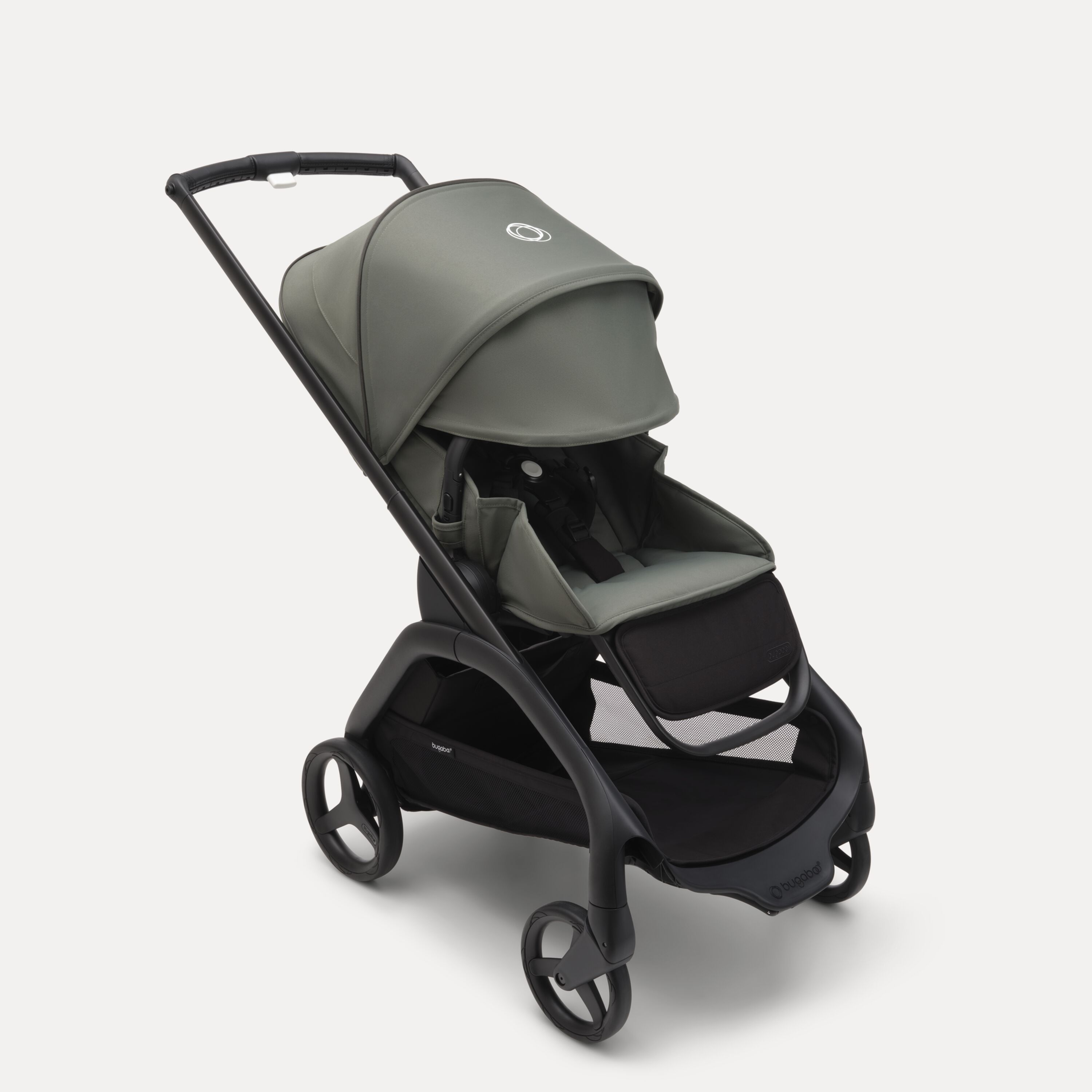 Bugaboo Dragonfly seat stroller with black chassis, forest green fabrics and forest green sun canopy. The sun canopy is fully extended. - Main Modal Image Slide 3 of 16