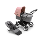 Bugaboo Donkey 5 Mono bassinet stroller with graphite chassis, grey melange fabrics and morning pink sun canopy, plus seat.