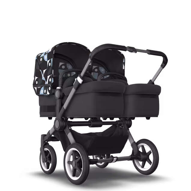 Bugaboo Donkey 5 twin stroller graphite base, midnight black fabrics, animal explorer green/light blue sun canopy - Main Image Slide 1 of 12