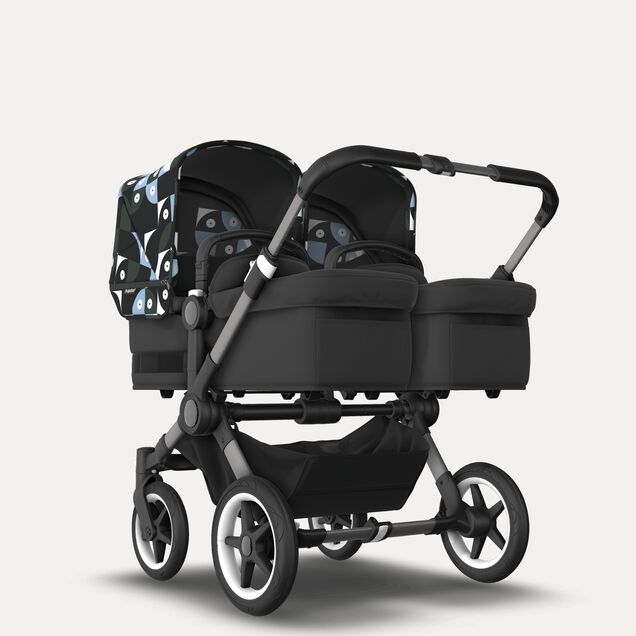 Bugaboo Donkey 5 twin stroller graphite base, midnight black fabrics, animal explorer green/light blue sun canopy - Main Image Slide 1 of 12