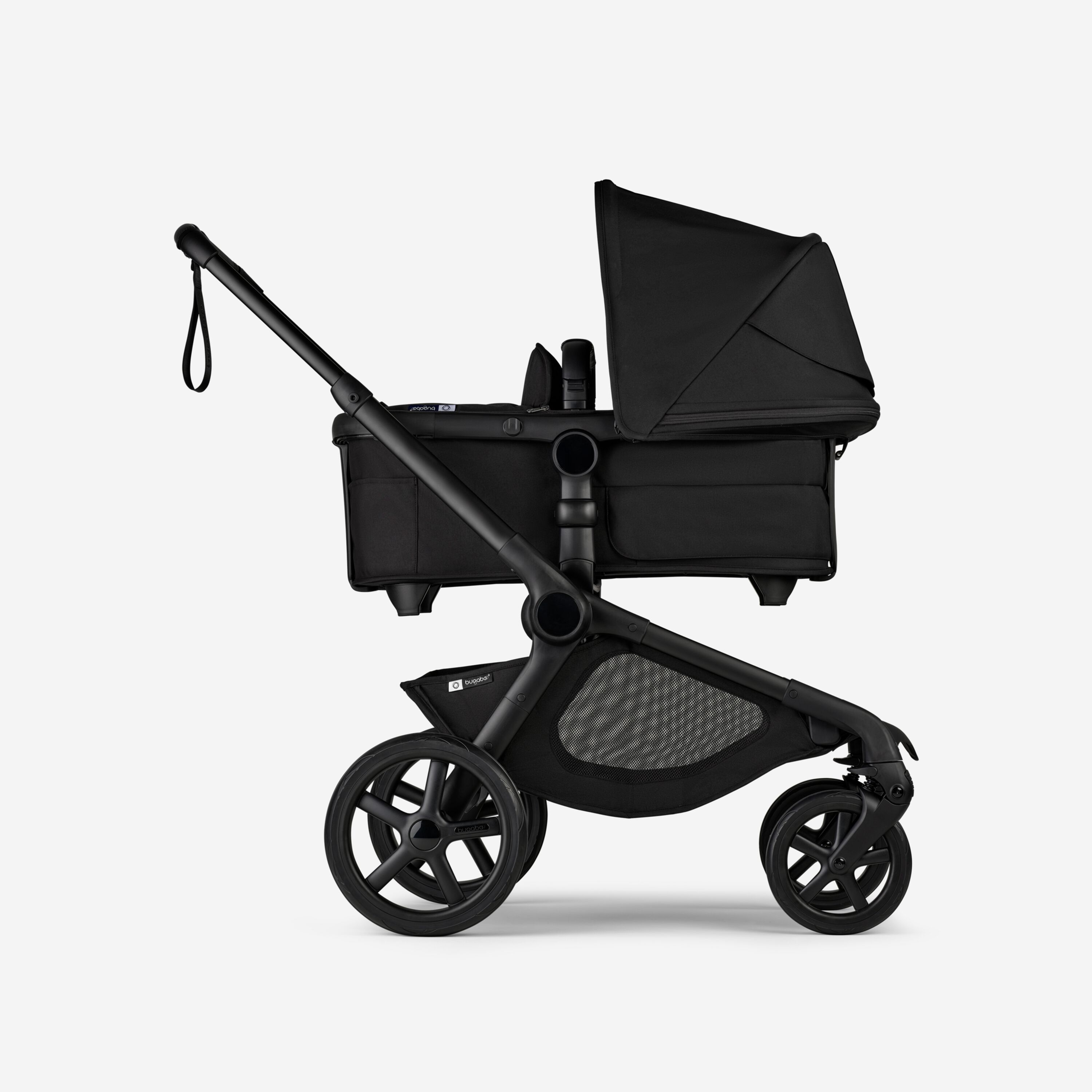 Side view of Bugaboo Kangaroo 2-in-1 stroller with one bassinet, Midnight Black fabrics, and Midnight Black sun canopy. - Main Modal Image Slide 2 of 18