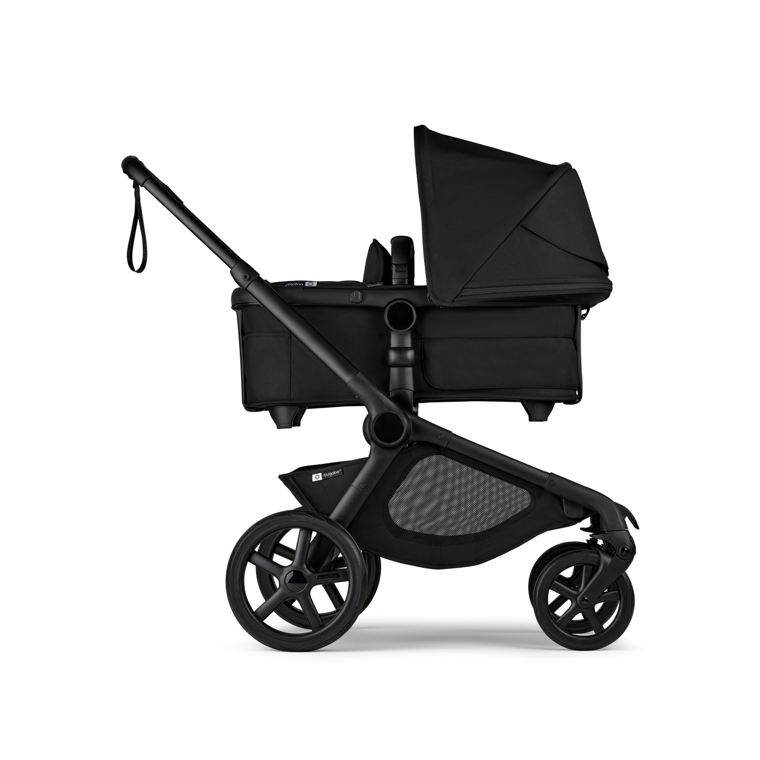 Side view of Bugaboo Kangaroo 2-in-1 stroller with one bassinet, Midnight Black fabrics, and Midnight Black sun canopy. - Thumbnail Slide 2 of 18