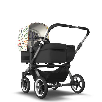 Bugaboo Donkey 5 Mono bassinet and seat stroller graphite base, midnight black fabrics, art of discovery white sun canopy - view 1