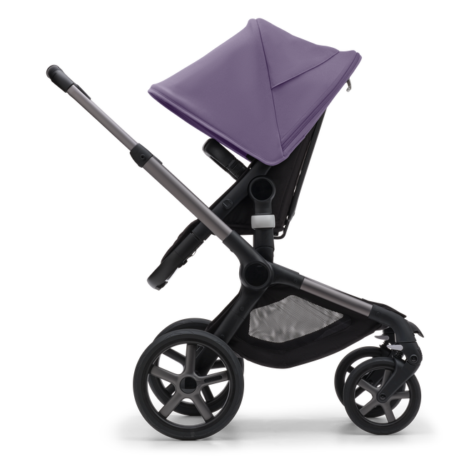 Side view of the Bugaboo Fox 5 seat pushchair with graphite chassis, midnight black fabrics and astro purple sun canopy.