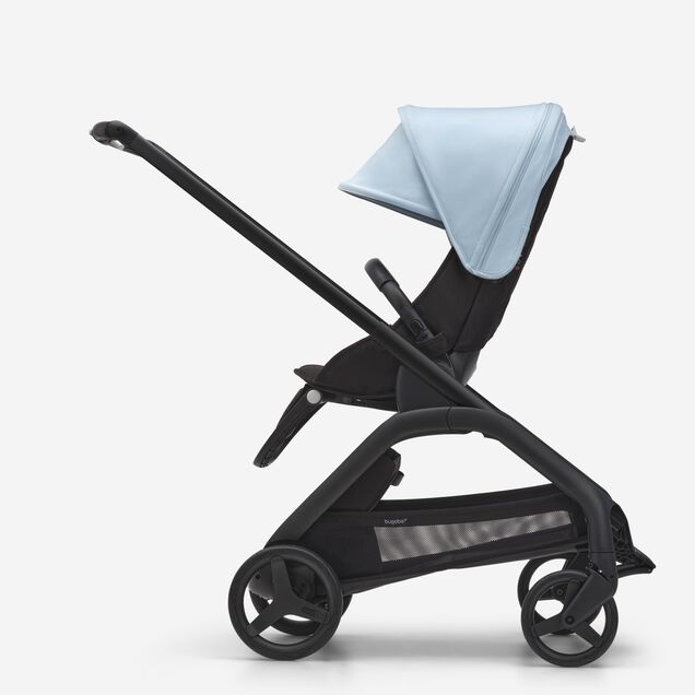 Side view of the Bugaboo Dragonfly seat stroller with black chassis, midnight black fabrics and skyline blue sun canopy. - Main Image Slide 2 of 16