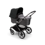 Bugaboo Fox 3 carrycot pushchair with graphite frame, grey melange fabrics, and black sun canopy. - Thumbnail Slide 2 of 7