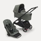 Bugaboo Dragonfly bassinet and seat pram with black chassis, forest green fabrics and forest green sun canopy.