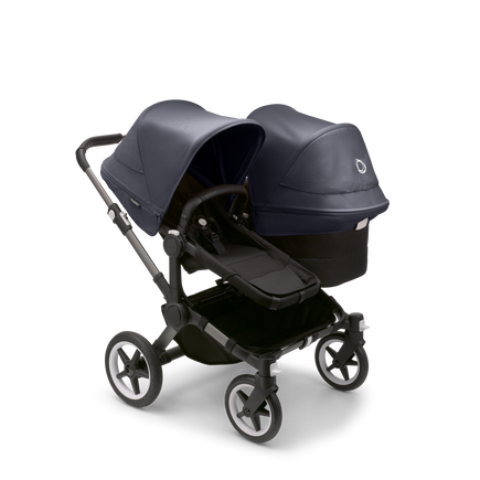 Bugaboo Donkey 5 Duo seat and bassinet stroller with graphite chassis, midnight black fabrics and stormy blue sun canopy.