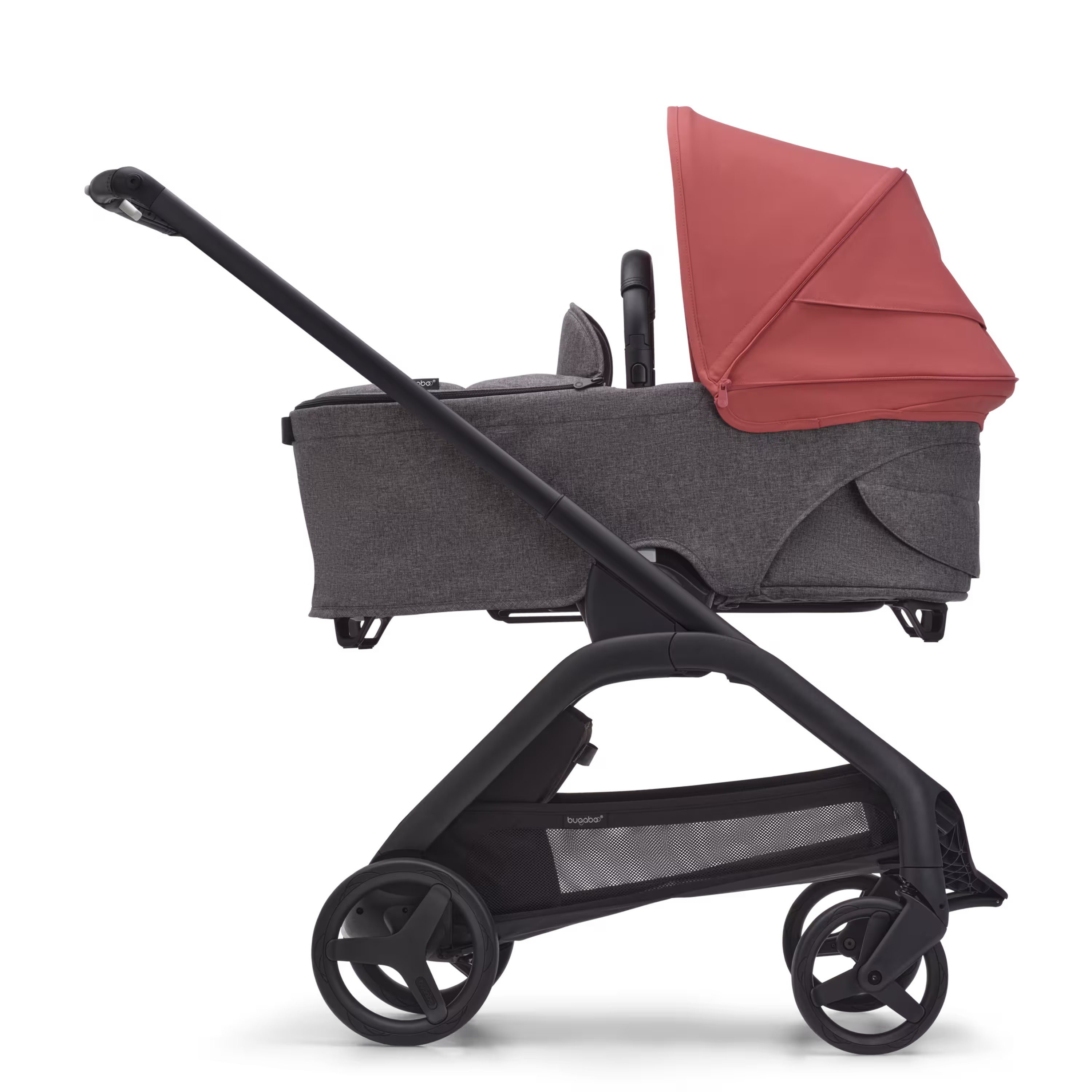 Side view of the Bugaboo Dragonfly bassinet stroller with black chassis, grey melange fabrics and sunrise red sun canopy. - Main Modal Image Slide 3 of 16