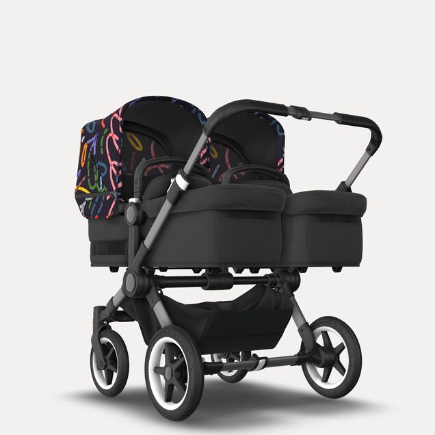 Bugaboo Donkey 5 twin stroller graphite base, midnight black fabrics, art of discovery dark blue sun canopy - Main Image Slide 1 of 12