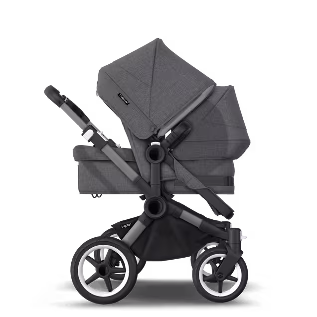 Refurbished Bugaboo Donkey 5 Mono bassinet and seat stroller graphite base, grey mélange fabrics, grey mélange sun canopy Bugaboo Donkey 5 Mono bassinet and seat stroller graphite base, grey mélange fabrics, grey mélange sun canopy - Main Image Slide 2 of 2