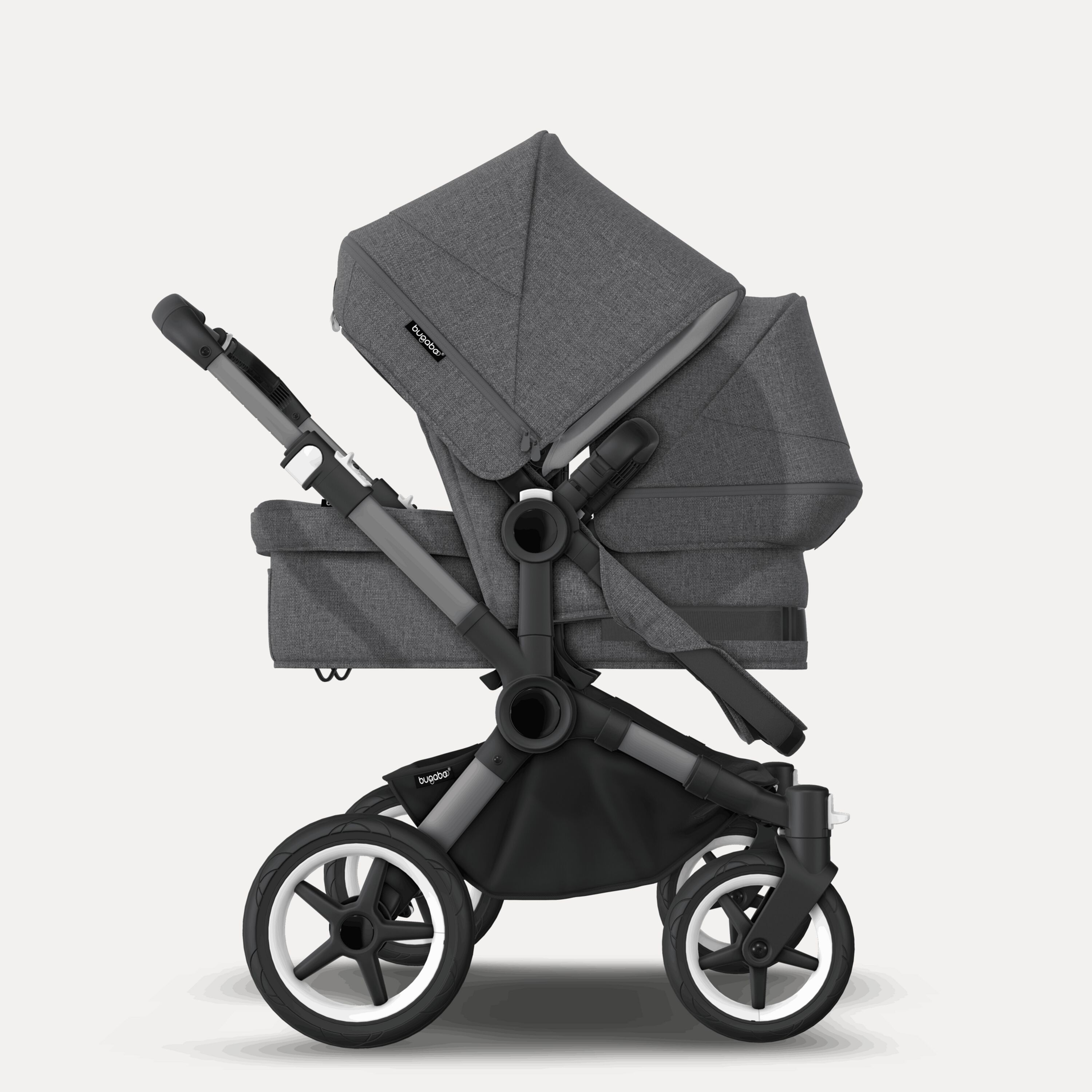 Refurbished Bugaboo Donkey 5 Mono bassinet and seat stroller graphite base, grey mélange fabrics, grey mélange sun canopy Bugaboo Donkey 5 Mono bassinet and seat stroller graphite base, grey mélange fabrics, grey mélange sun canopy - Main Modal Image Slide 2 van 2
