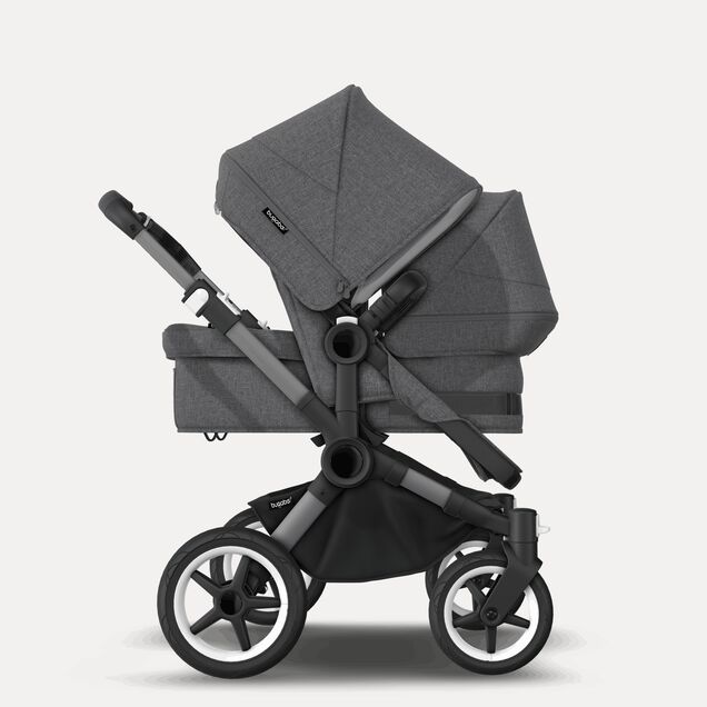 Refurbished Bugaboo Donkey 5 Mono bassinet and seat stroller graphite base, grey mélange fabrics, grey mélange sun canopy Bugaboo Donkey 5 Mono bassinet and seat stroller graphite base, grey mélange fabrics, grey mélange sun canopy - Main Image Slide 2 van 2
