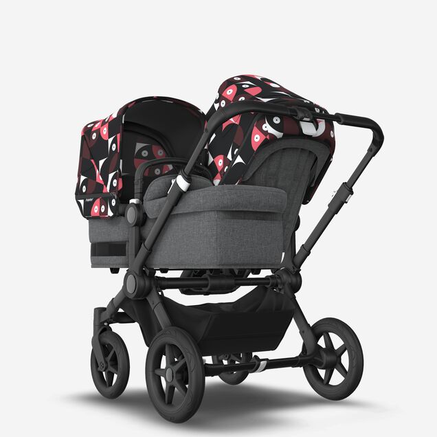 Bugaboo Donkey 5 Duo double stroller black base, grey mélange fabrics, animal explorer pink/ red sun canopy - Main Image Slide 1 of 10