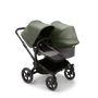 Bugaboo Donkey 5 Duo seat and bassinet stroller with black chassis, grey melange fabrics and forest green sun canopy. - Thumbnail Slide 1 of 12