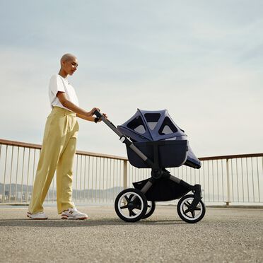 Bugaboo Donkey 5 Mono 2-in-1 stroller graphite base, grey mélange fabrics, animal explorer green/ light blue sun canopy