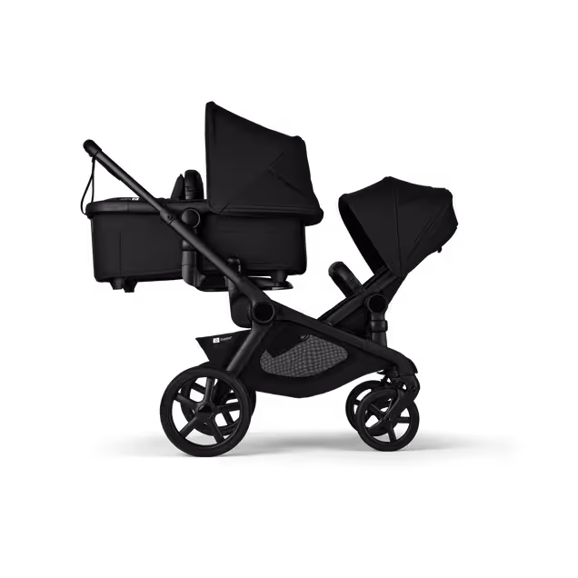 Bugaboo Kangaroo 2-in-1 tandem stroller with one bassinet above and one seat below, with Midnight Black fabrics and Midnight Black sun canopies. - Main Image Slide 2 of 18
