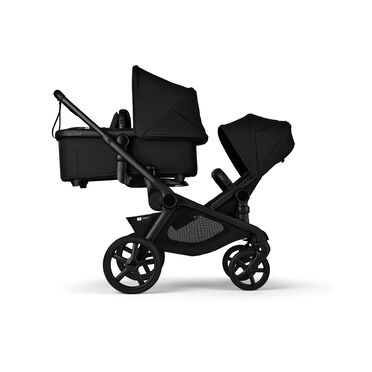 Bugaboo Kangaroo 2-in-1 tandem stroller with one bassinet above and one seat below, with Midnight Black fabrics and Midnight Black sun canopies. - view 2