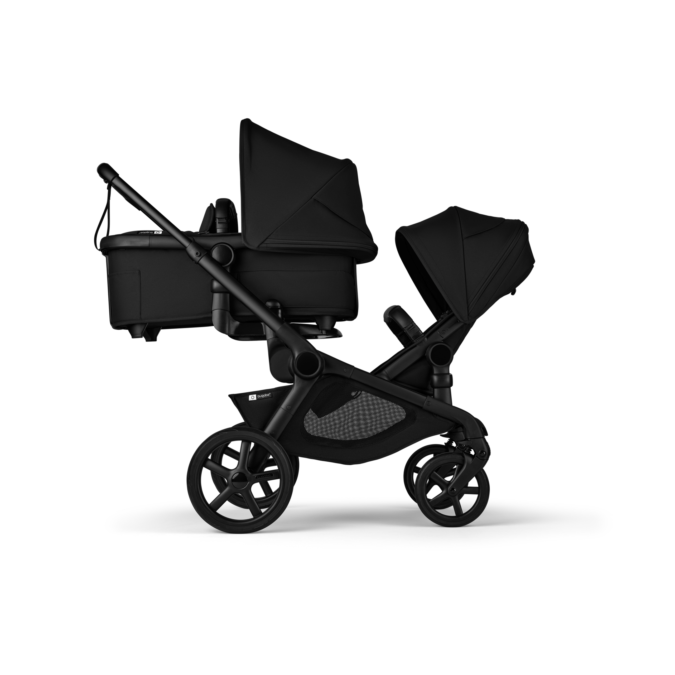 Bugaboo Kangaroo 2-in-1 tandem stroller with one bassinet above and one seat below, with Midnight Black fabrics and Midnight Black sun canopies. - Thumbnail Slide 1 of 18