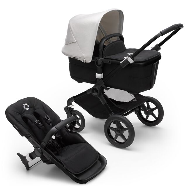 Bugaboo Fox 3 pram body and seat stroller with black frame, black fabrics, and white sun canopy. - Main Image Slide 1 of 9