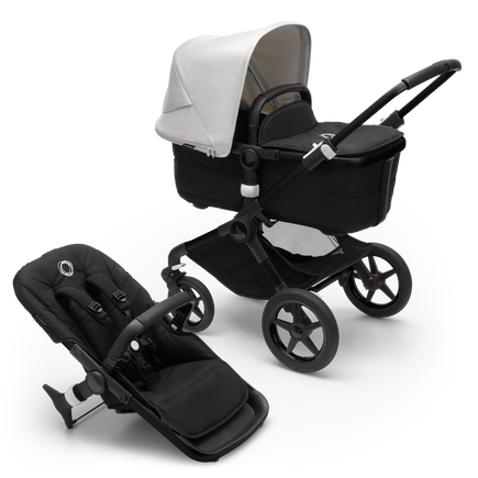 Bugaboo Fox 3 pram body and seat stroller with black frame, black fabrics, and white sun canopy.
