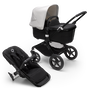 Bugaboo Fox 3 pram body and seat stroller with black frame, black fabrics, and white sun canopy. - Thumbnail Slide 1 of 9