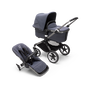 Bugaboo Fox 3 bassinet and seat stroller with graphite frame, stormy blue fabrics, and stormy blue sun canopy. - Thumbnail Slide 1 of 9