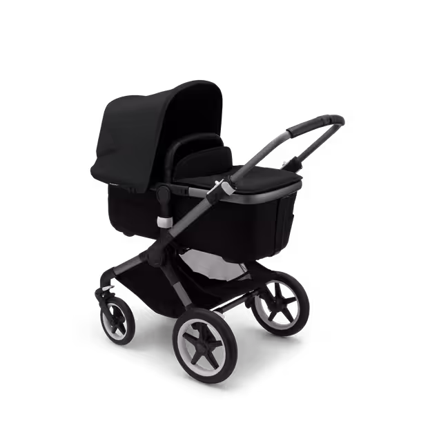 Bugaboo Fox 3 bassinet stroller with graphite frame, black fabrics, and black sun canopy. - Main Image Slide 2 of 7
