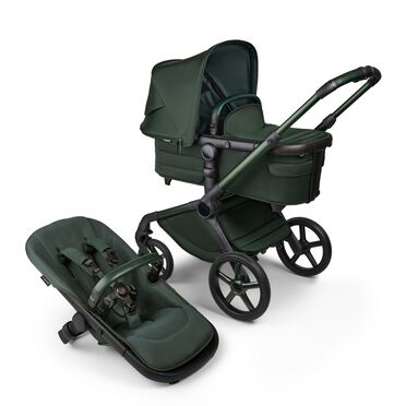 Bugaboo Fox 5 Noir Limited Edition bassinet and seat stroller, with Midnight Green chassis, Midnight Green fabrics, and Midnight Green sun canopy.