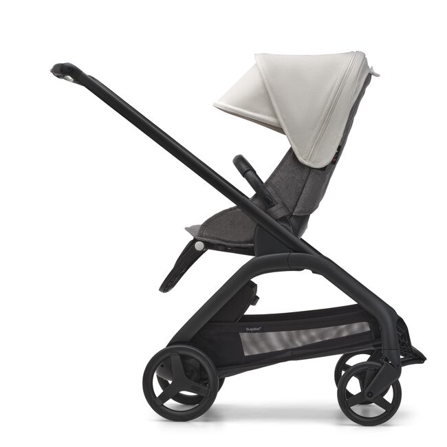 Side view of the Bugaboo Dragonfly seat stroller with black chassis, grey melange fabrics and misty white sun canopy. - Main Image Slide 3 of 18