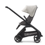Side view of the Bugaboo Dragonfly seat stroller with black chassis, grey melange fabrics and misty white sun canopy. - Thumbnail Slide 3 of 18