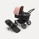Refurbished Bugaboo Donkey 5 Mono bassinet and seat stroller black base, midnight black fabrics, morning pink sun canopy