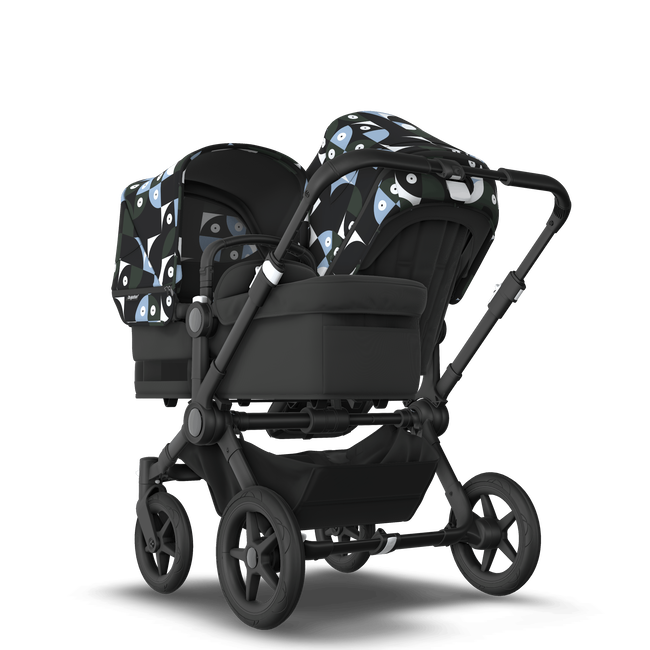 Bugaboo Donkey 5 Duo bassinet and seat stroller black base, midnight black fabrics, animal explorer green/ light blue sun canopy