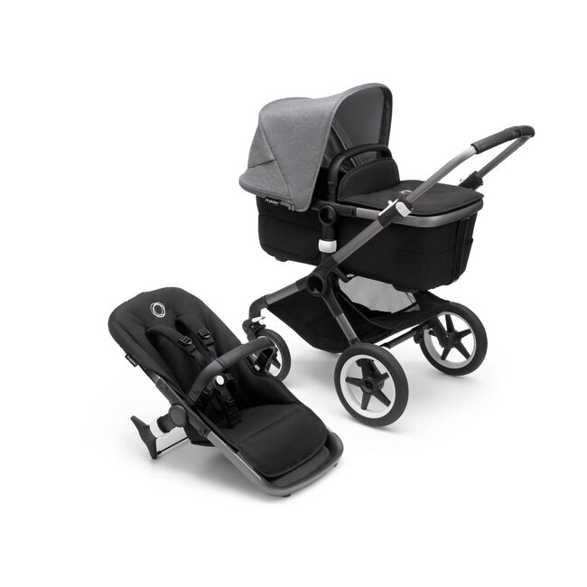 Bugaboo Fox 3 bassinet and seat stroller with graphite frame, black fabrics, and grey sun canopy. - Main Image Slide 1 of 7