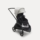 Bugaboo Dragonfly seat stroller with black chassis, midnight black fabrics and misty white sun canopy.