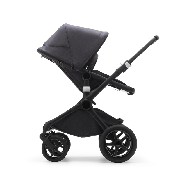 Side view of a Fox 3 seat stroller with black frame, mineral black fabrics, and mineral black sun canopy.