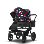 Bugaboo Donkey 5 Duo bassinet and seat stroller black base, midnight black fabrics, animal explorer red/ blue sun canopy