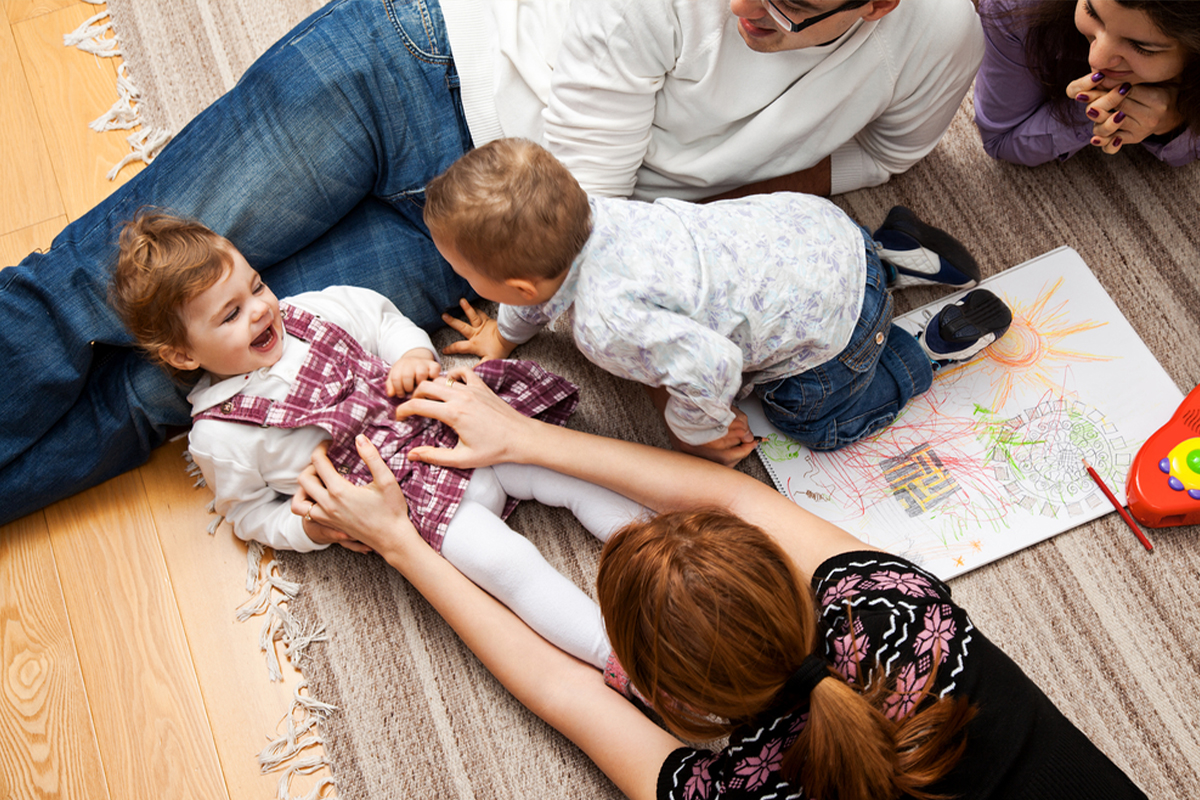 Family enjoying life with twins