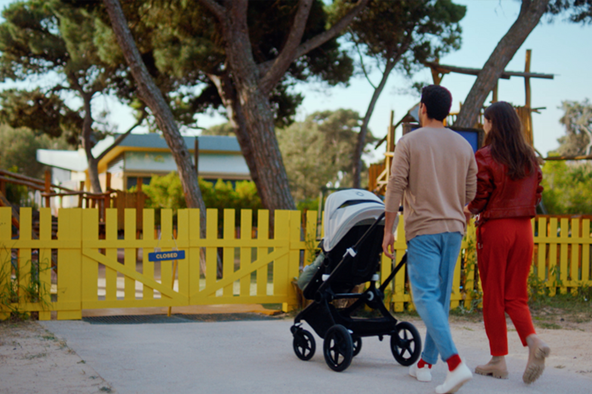 Couple taking a walk with their baby